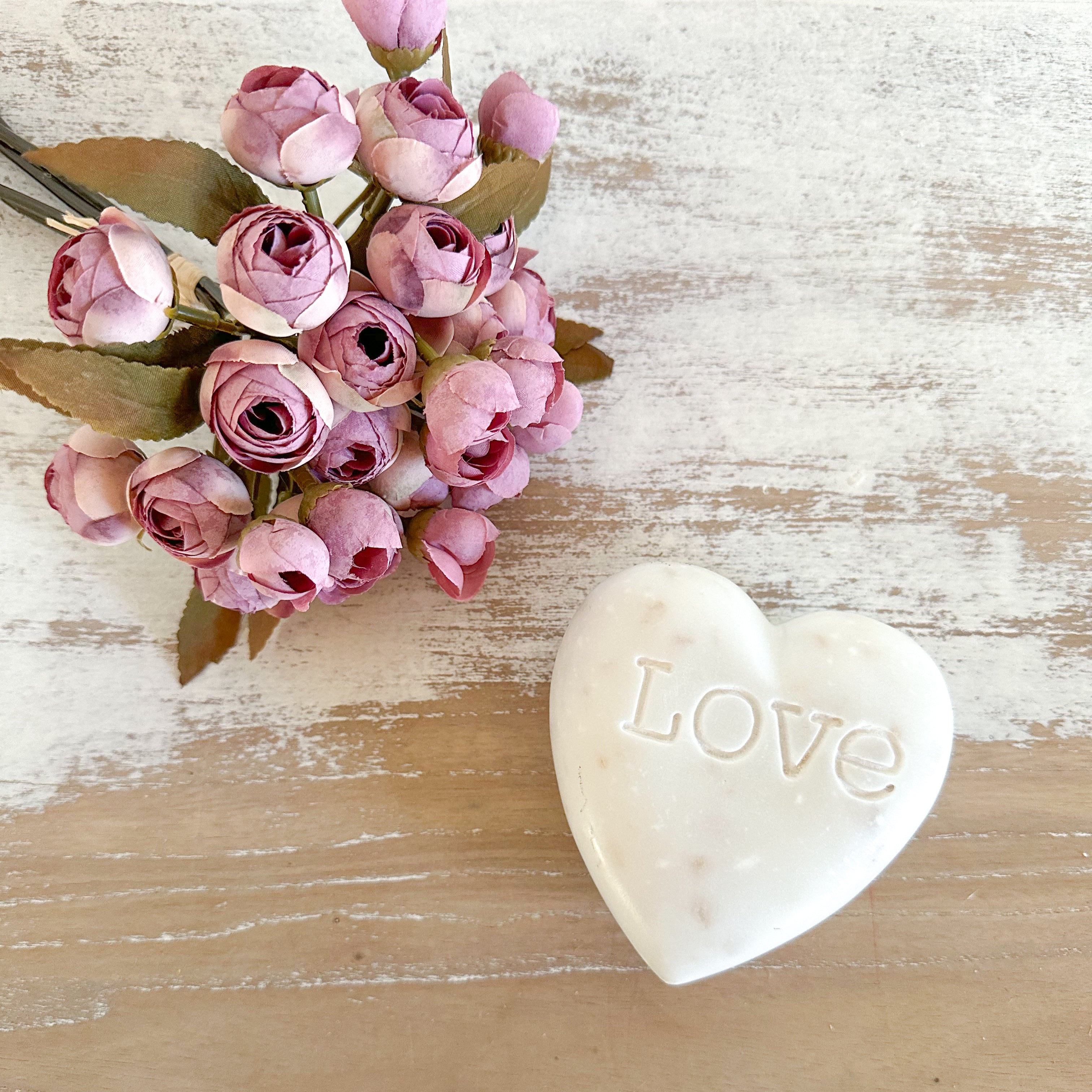 White Heart Shaped Soap Stone Etched With The Word Love